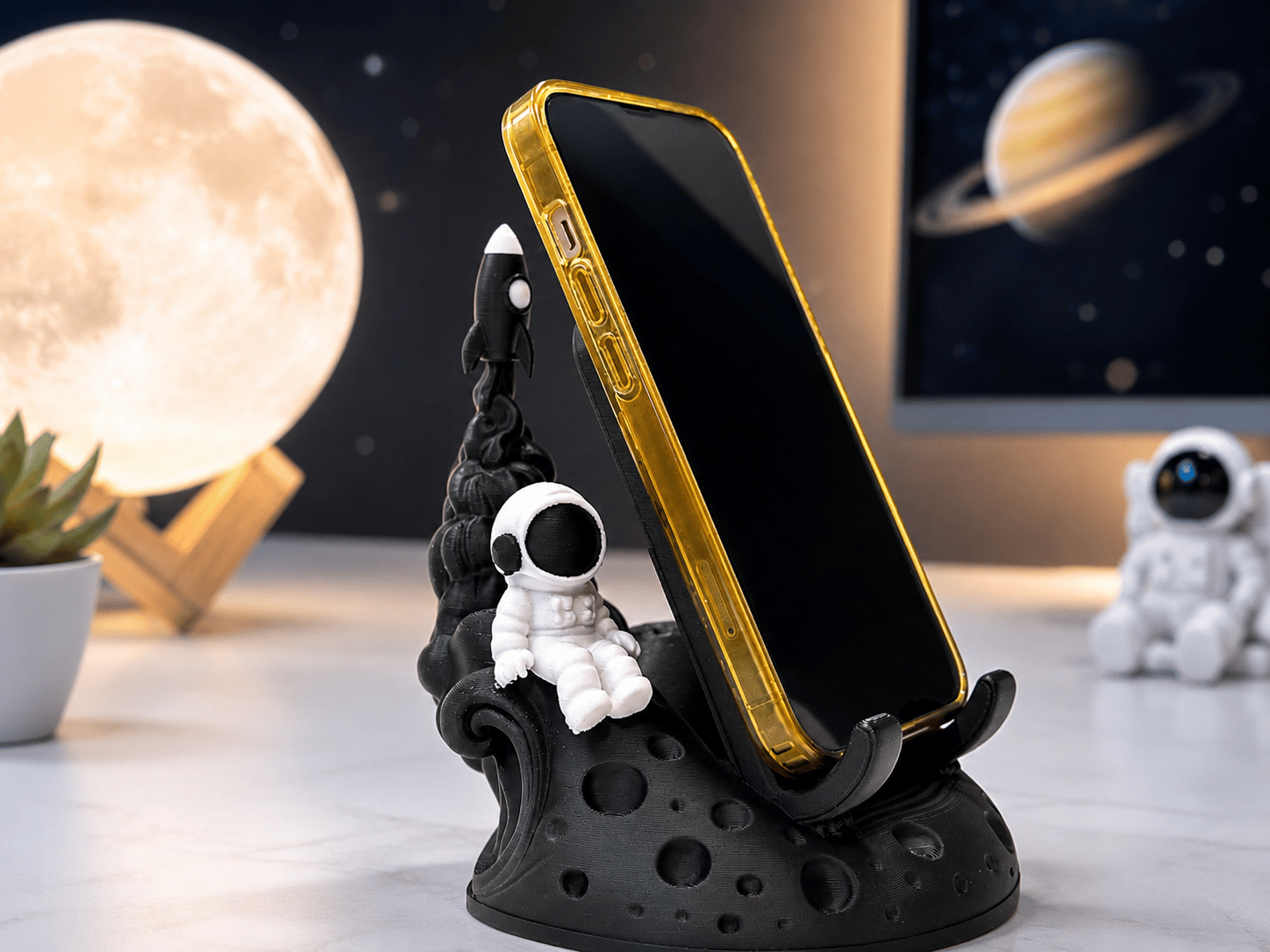 Suport telefon astronaut pe Lună